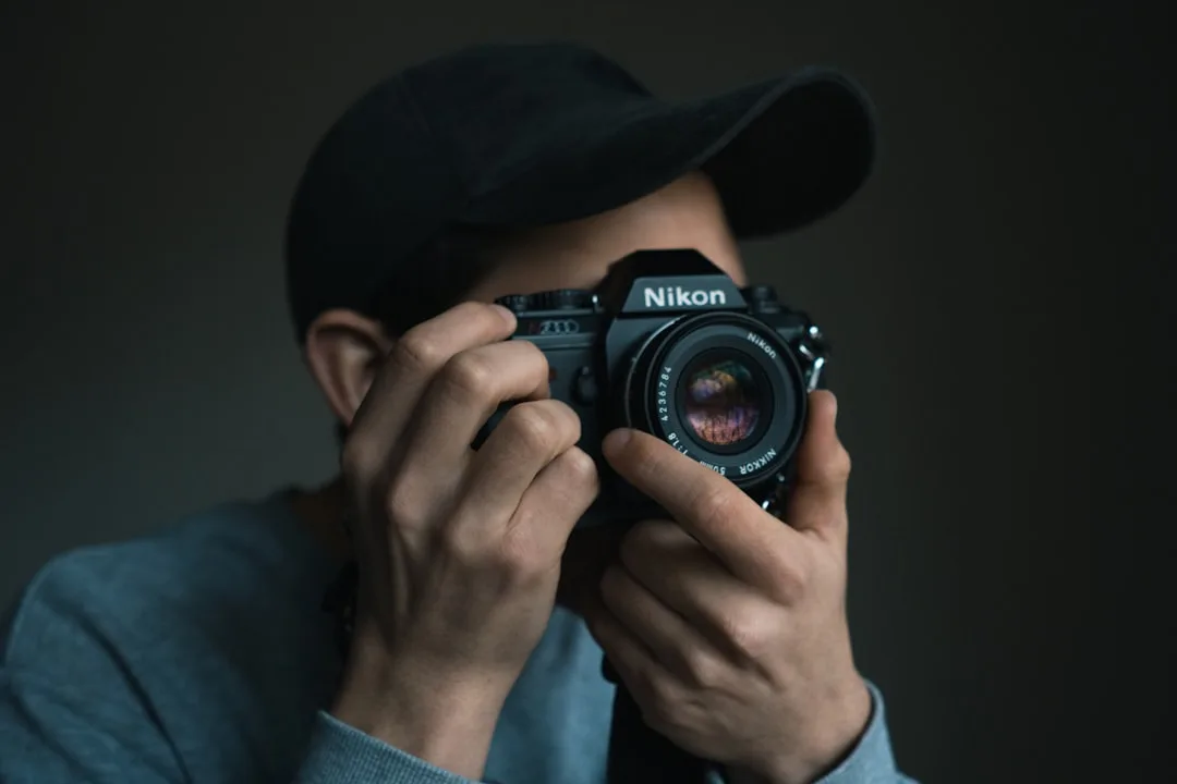 photographer using camera professionally