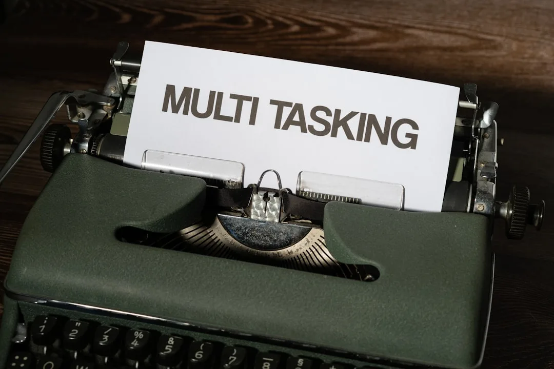 person overwhelmed with tasks