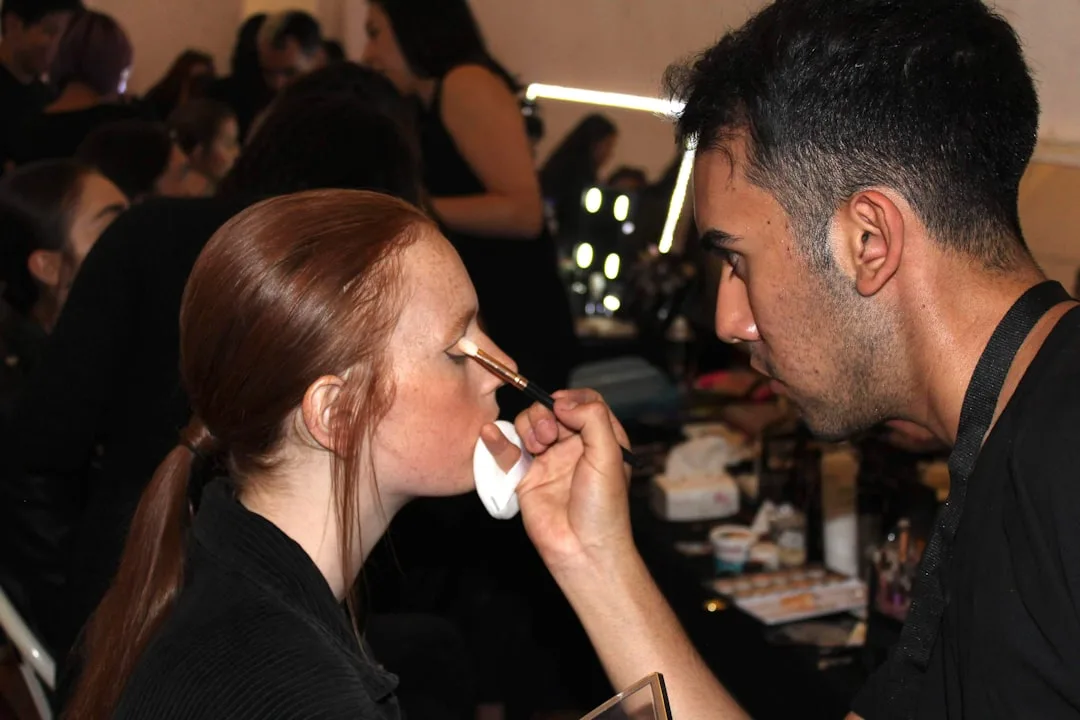 makeup artist working closely